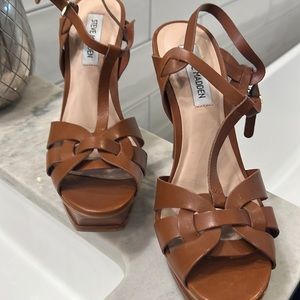 NWOT just tried on . Beautiful but way too high of a heel.